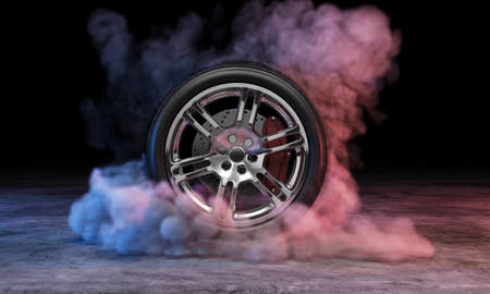 3D rendering of a car wheel with smoke on a dark backgroundの写真素材