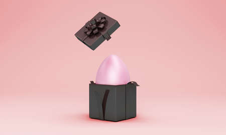 Easter egg in black gift box on pink background. 3d renderの写真素材