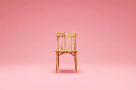 Wooden Chair on pink studio backgroundの写真素材