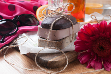 Three piece of natural handmade soap  Chocolate, orange and scrub soapsの写真素材