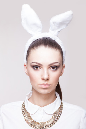 Closeup portrait of beautiful model in bunny costumeの写真素材