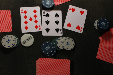 Poker play. Chips and cards,texas holdem game.