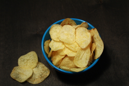 Crunchy delicious potato chips for a tasty snack breakの写真素材