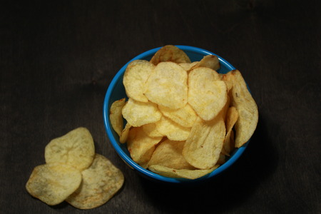 Crunchy delicious potato chips for a tasty snack breakの写真素材