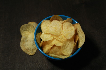 Crunchy delicious potato chips for a tasty snack breakの写真素材