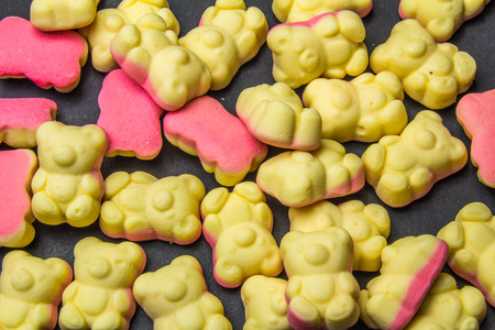 Gummy bears sweet candy on black backgroundの写真素材