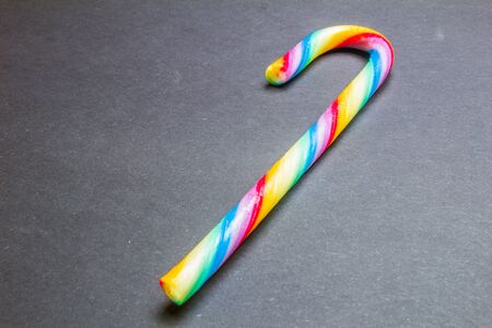 Mint hard candy cane striped in Christmas colours on a black backgroundの写真素材