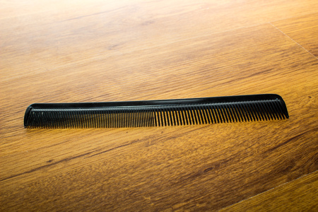 Hair Combs on wooden backgroundの写真素材