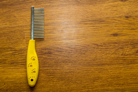 Hair Combs on wooden backgroundの写真素材