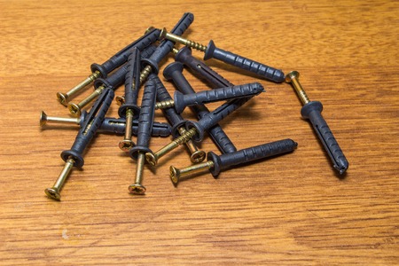 Plastic dowel or wall plugs pin with screws for bricks