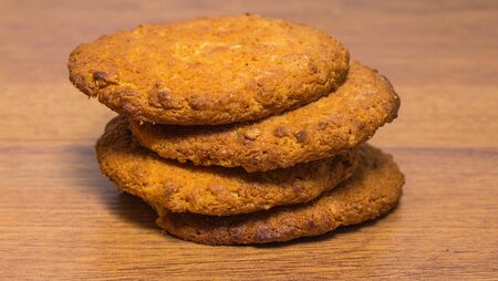 oat cookies on wooden tableの写真素材