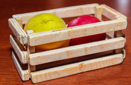 Wooden crate box full of fresh applesの写真素材