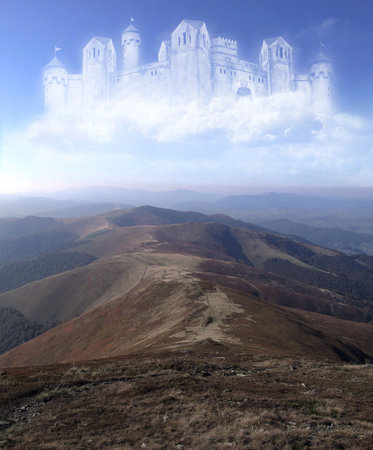 Ghostly castle floating in the cloudsの写真素材