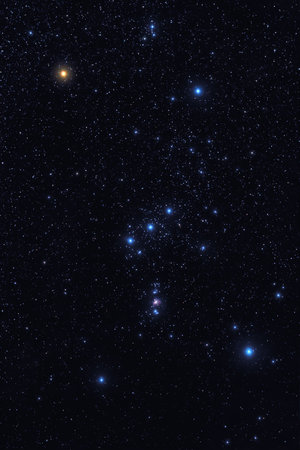 Dark night sky with bright shining stars of Orion constellation