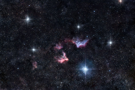 Astronomical image of the cosmic nebulae IC59 and IC63 in the constellation Cassiopeia, acquired with amateur telescope and DSLR cameraの写真素材