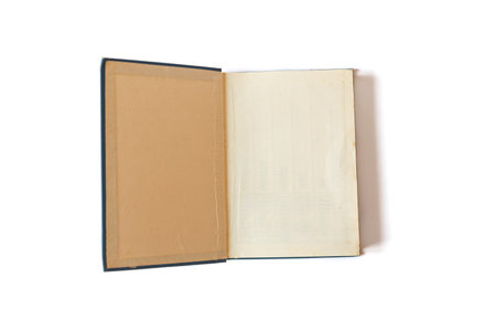 Open old book with yellow pages  isolated on white backgroundの写真素材