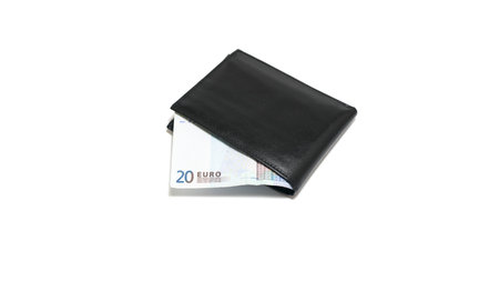 Black leather wallet with euros isolated on white background.の写真素材
