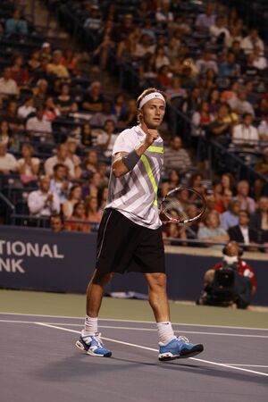 TORONTO: AUGUST 09. Peter Polansky plays against Jurgen Melzer in the Rogers Cup 2010 on August 09, 2010 in Toronto, Canada.のeditorial素材