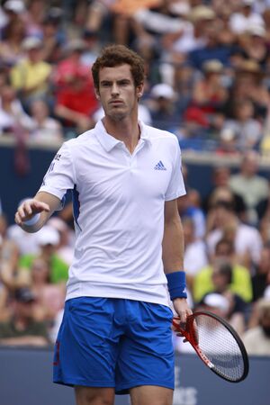 TORONTO: AUGUST 15. Andy Murray plays against Roger Federer in the Rogers Cup 2010 finals on August 15, 2010 in Toronto, Canada.のeditorial素材