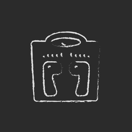 Weighing scale hand drawn in chalk on a blackboard vector white icon isolated on a black background.のイラスト素材