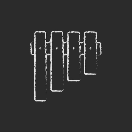 Vibraphone hand drawn in chalk on a blackboard vector white icon isolated on a black background.のイラスト素材