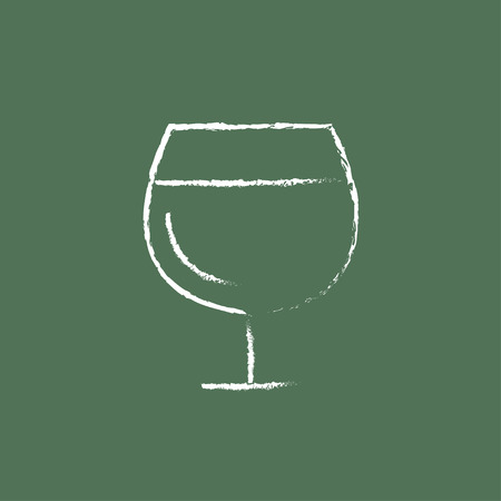 Glass of wine hand drawn in chalk on a blackboard vector white icon isolated on a green background.のイラスト素材