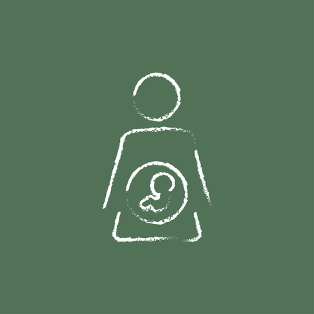 Baby fetus in womb hand drawn in chalk on a blackboard vector white icon isolated on a green background.のイラスト素材