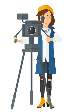 A camerawoman looking through movie camera on a tripod vector flat design illustration isolated on white background.のイラスト素材
