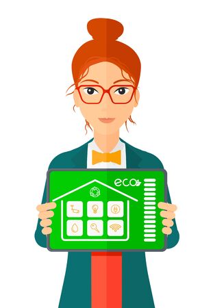 A woman holding a tablet computer with smart home application on a screen vector flat design illustration isolated on white background.のイラスト素材