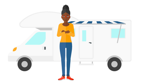 An african-american woman standing in front of motor home vector flat design illustration isolated on white background.のイラスト素材