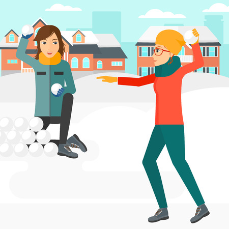 Two women playing in snowballs outdoors on city background vector flat design illustration. Square layout.のイラスト素材