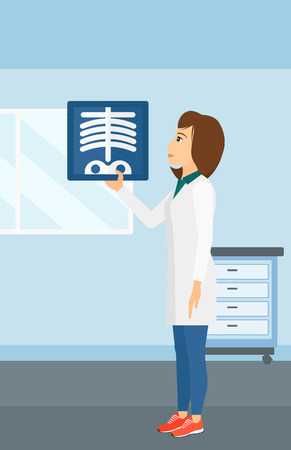 A doctor examining a radiograph on the background of medical office vector flat design illustration. Vertical layout.のイラスト素材