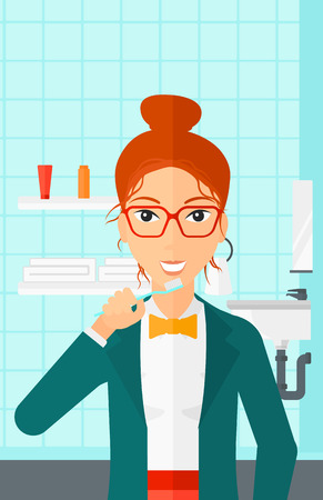 A woman brushing her teeth with a toothbrush in bathroom vector flat design illustration. Vertical layout.のイラスト素材
