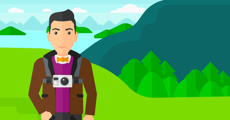 A man with a camera on his chest on the background of mountains and lake vector flat design illustration. Horizontal layout.のイラスト素材