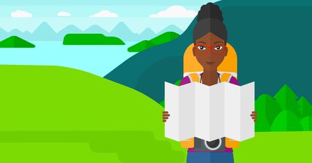 An african-american woman with a camera looking at a map on the background of landscape with mountains and lake vector flat design illustration. Horizontal layout.のイラスト素材