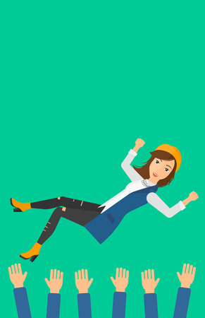 A business woman get thrown into the air by coworkers during celebration on a green background vector flat design illustration. Vertical layout.のイラスト素材
