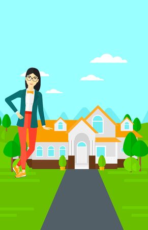 An asian real estate agent standing near the house with beautiful landscape vector flat design illustration. Vertical layout.のイラスト素材