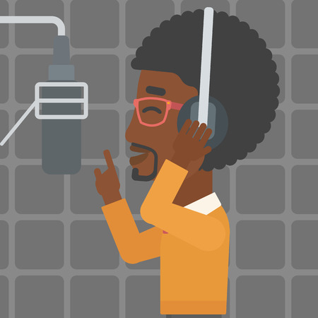 An african-american man in headphones making a record of his voice in studio vector flat design illustration. Square layout.のイラスト素材