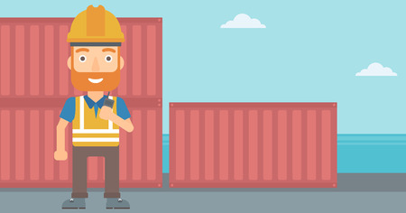 A hipster man with the beard talking to a portable radio on cargo containers background vector flat design illustration. Horizontal layout.のイラスト素材
