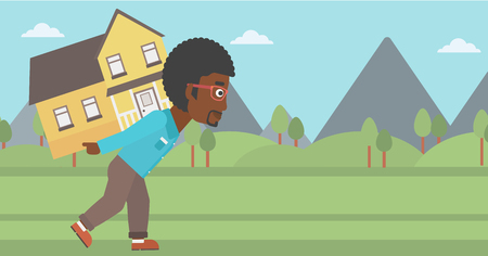 An african-american man carrying a big house on his back on the background of mountains. Vector flat design illustration. Horizontal layout.のイラスト素材