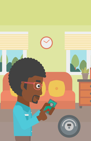 An african-american man controlling robotic vacuum cleaner with his smartphone in the living room. Vector flat design illustration. Vertical layout.のイラスト素材