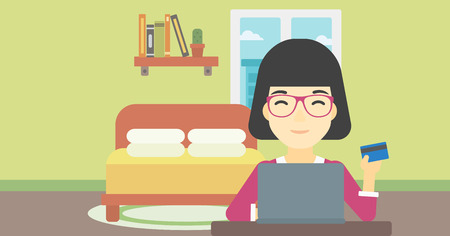 An asian woman holding a credit card and using laptop for online shopping. Woman shopping online at home. Woman making online payment. Vector flat design illustration. Horizontal layout.のイラスト素材