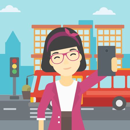 An asian woman making selfie. Woman taking photo with cellphone. Woman looking at smartphone and taking selfie on the background of city. Vector flat design illustration. Square layout.のイラスト素材