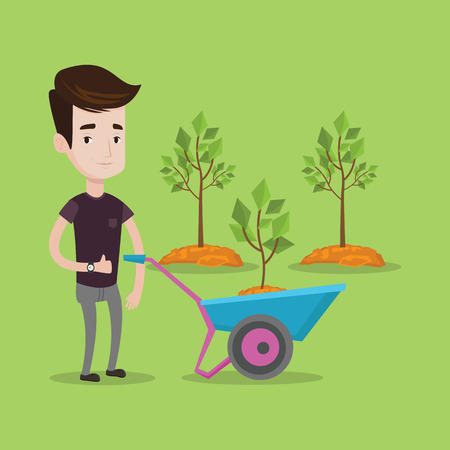 Young man pushing wheelbarrow with plant and dirt in the park. A gardener with wheelbarrow on a background of newly planted trees. Vector flat design illustration. Square layout.のイラスト素材