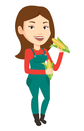 Happy female farmer holding a corn cob. Smiling caucasian female farmer collecting corn. Female farmer standing with a corn cob in hands. Vector flat design illustration isolated on white background.のイラスト素材