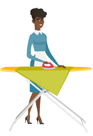 African maid ironing clothes on ironing board.のイラスト素材