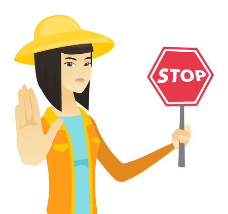 Young asian farmer holding stop road sign.のイラスト素材