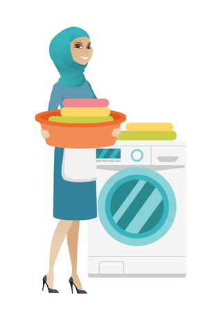 Muslim housewife using washing machine at home laundry. Full length of young happy housewife loading laundry washing machine with clothes. Vector flat design illustration isolated on white background.のイラスト素材