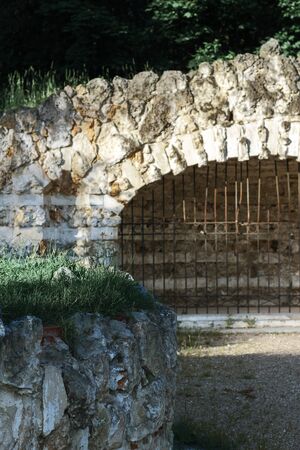 Former salt grottoes in Kuzminsky park, Moscow, in dark and moody tones with unfocused backgroundの写真素材