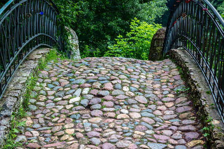 Old stone bridge across the riverの写真素材